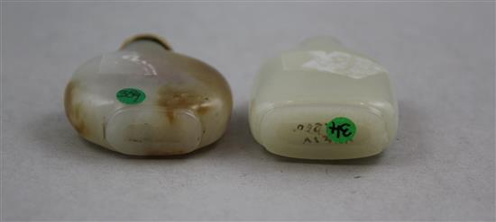 Two Chinese pale celadon jade snuff bottles, 1800-1900, Richards no.s 34 and 359